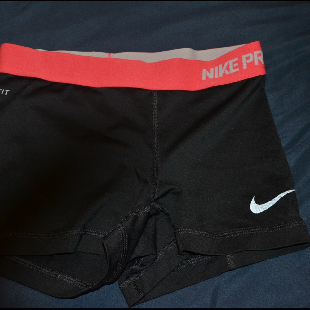 nike pro spandex with pink rim!